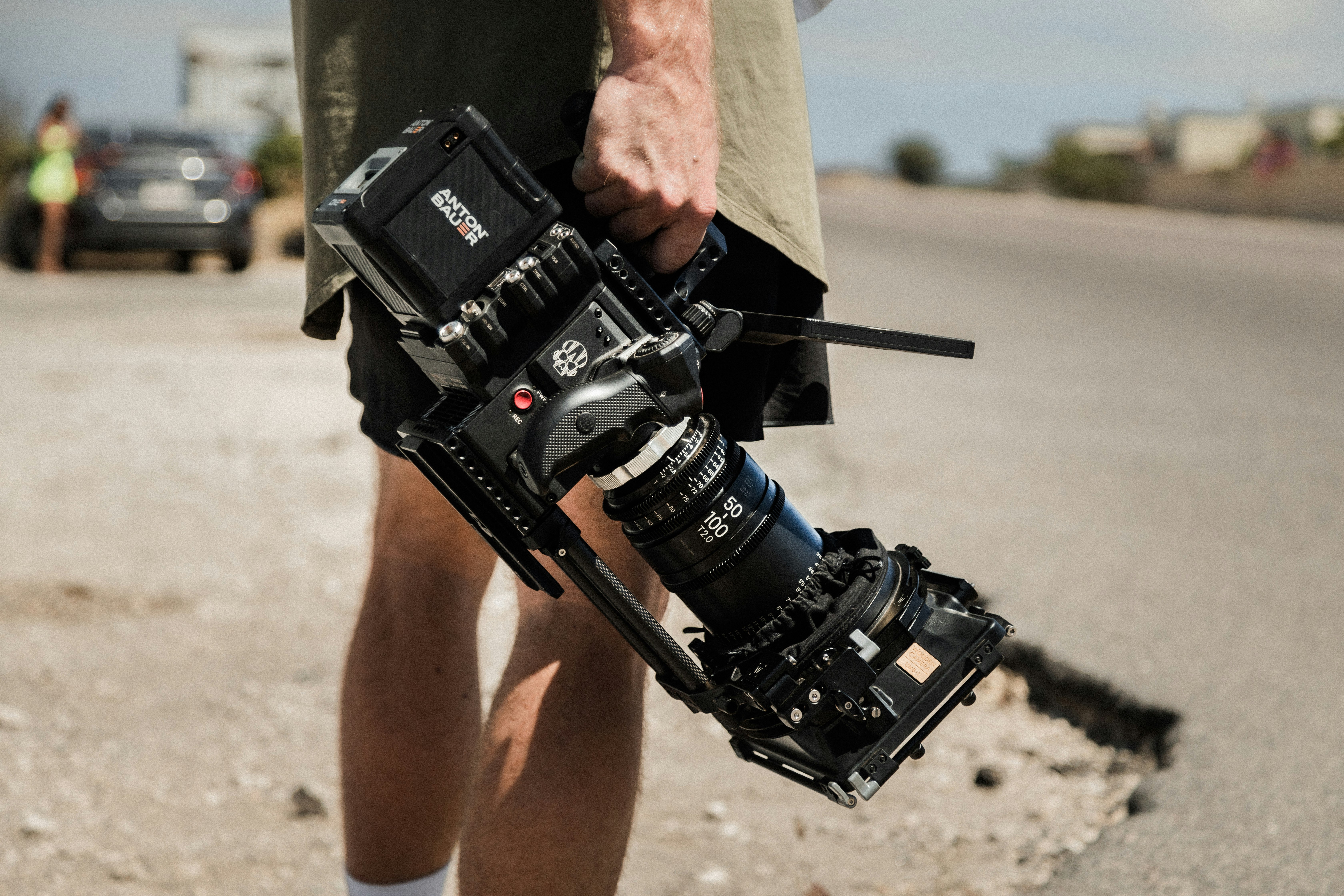 person holding black dslr camera